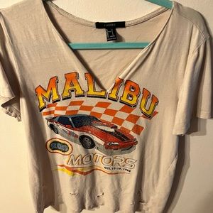 Forever 21 car shirt the holes in the shirt were like that when I bought it.